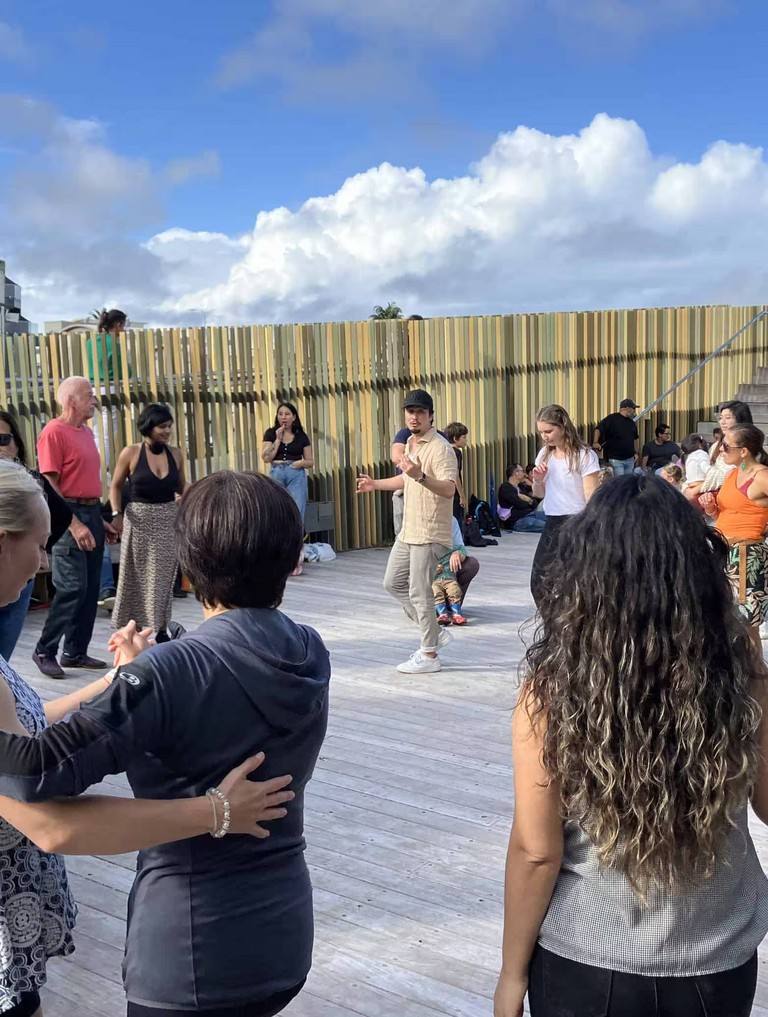 NSLD instructor teaching a group class at an outdoor dance event